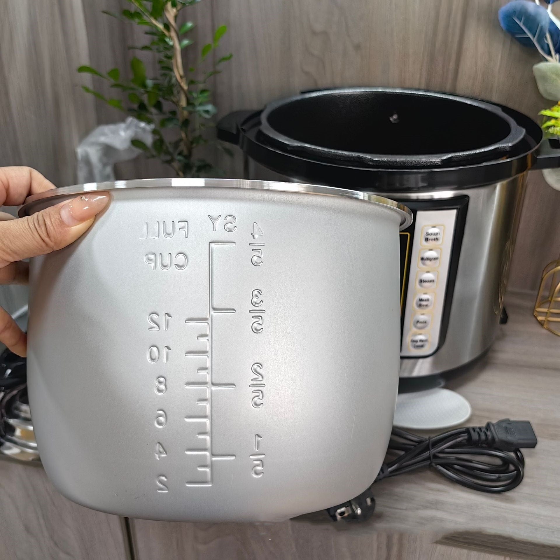 6L Electric Pressure Cooker Multi-functional Large Capacity Cooker with digital control panel and preset cooking modes, ideal for rice, soup, and meat.