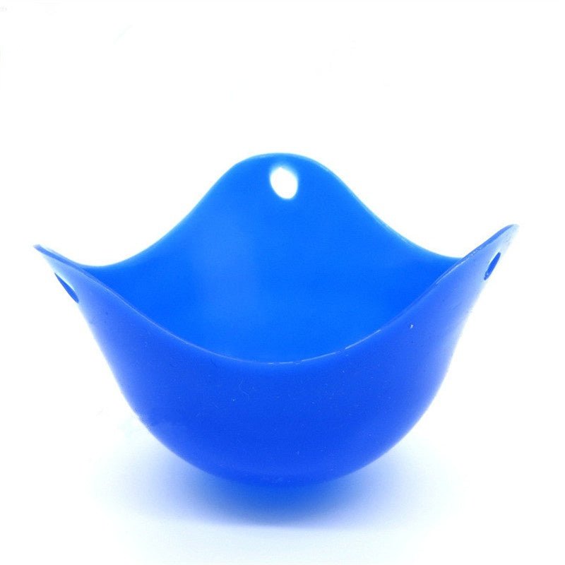 Green Silicone Egg Cooker 4 Color Silicone Egg Cooker set with eggs cooking in colorful silicone cups in a frying pan. Heat-resistant, non-stick kitchen tool.