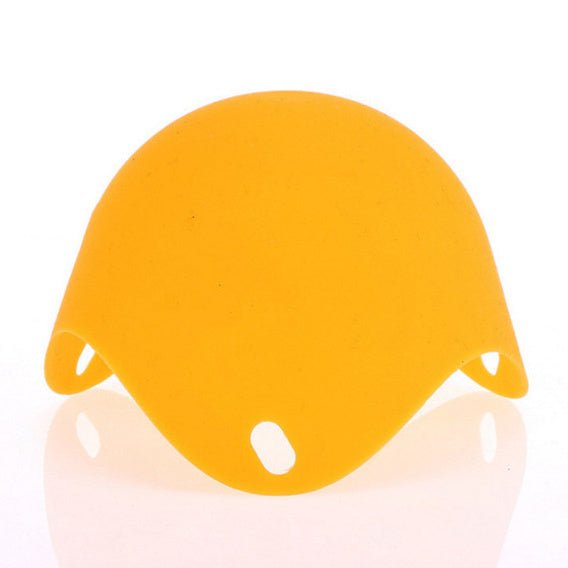 Green Silicone Egg Cooker 4 Color Silicone Egg Cooker set with eggs cooking in colorful silicone cups in a frying pan. Heat-resistant, non-stick kitchen tool.