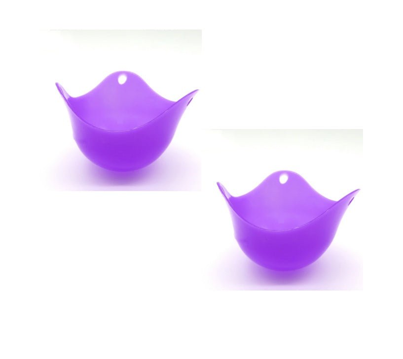 Green Silicone Egg Cooker 4 Color Silicone Egg Cooker set with eggs cooking in colorful silicone cups in a frying pan. Heat-resistant, non-stick kitchen tool.