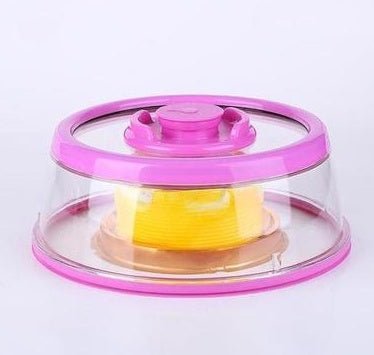 Kitchen Fresh-Keeping Cover Vacuum Food Sealer with BPA-free lid shown sealing fresh vegetables. Ideal for food storage and freezer-safe use.