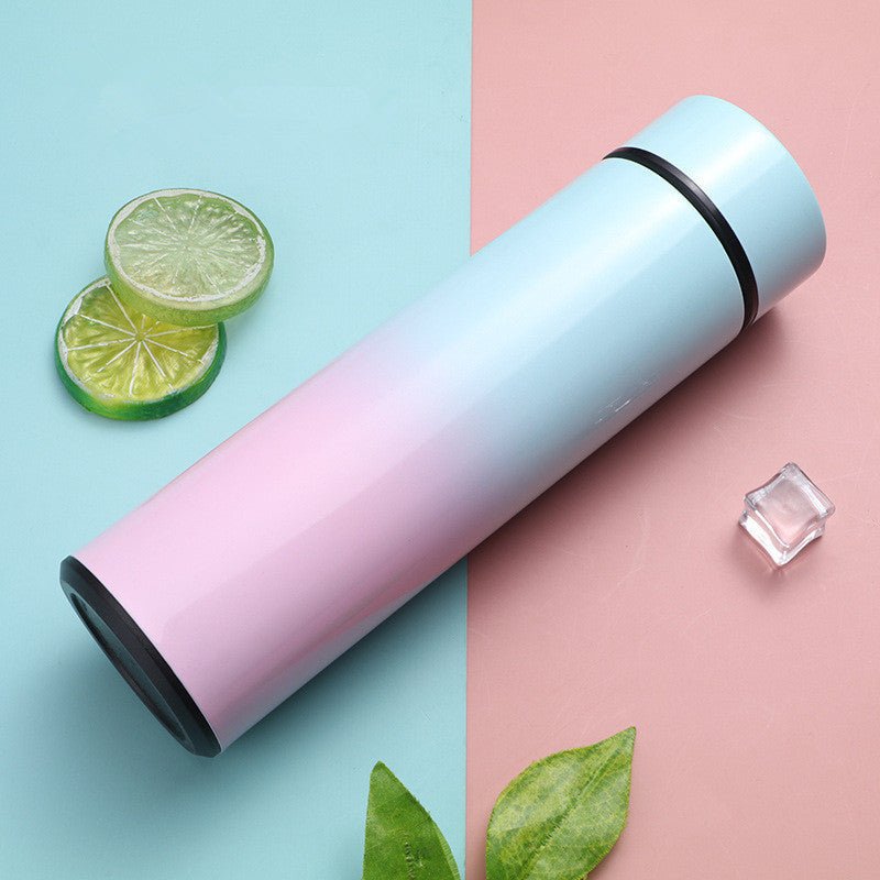 Intelligent stainless steel bottle cup temperature display vacuum flasks in pastel gradient colors, ideal for travel and hot or cold beverages.