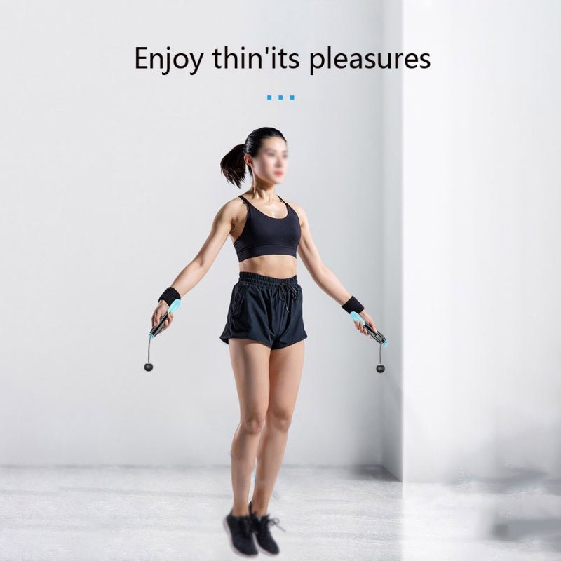 Woman exercising with cordless jump ropes for fitness and calorie burning indoors