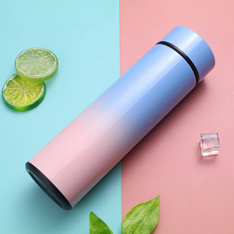 Intelligent stainless steel bottle cup temperature display vacuum flasks in pastel gradient colors, ideal for travel and hot or cold beverages.
