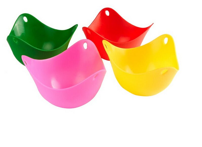 Green Silicone Egg Cooker 4 Color Silicone Egg Cooker set with eggs cooking in colorful silicone cups in a frying pan. Heat-resistant, non-stick kitchen tool.