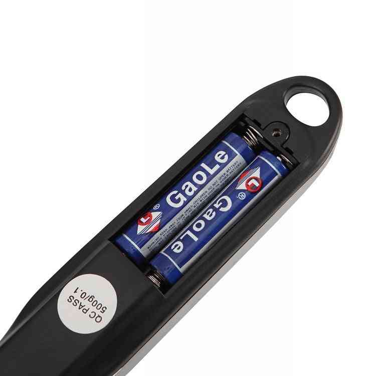 Digital Measuring Spoon with LCD display showing weight of granules, precision up to 500g and 0–30ml volume capacity, powered by AAA batteries.