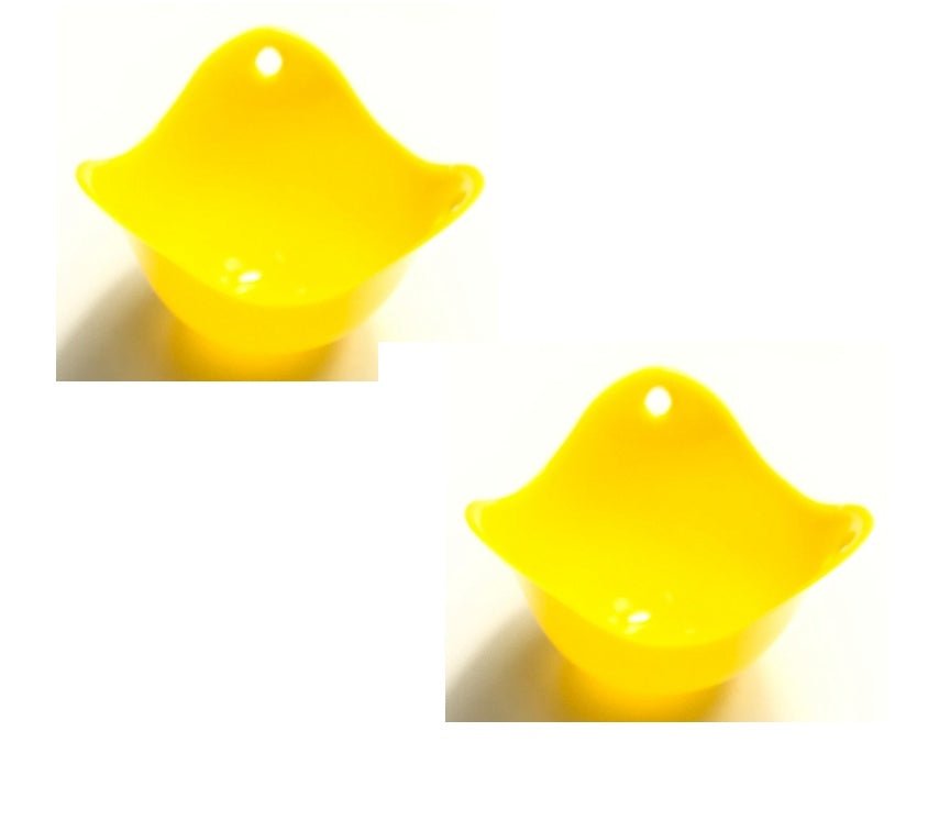 Green Silicone Egg Cooker 4 Color Silicone Egg Cooker set with eggs cooking in colorful silicone cups in a frying pan. Heat-resistant, non-stick kitchen tool.