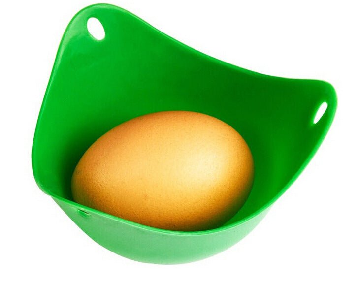 Green Silicone Egg Cooker 4 Color Silicone Egg Cooker set with eggs cooking in colorful silicone cups in a frying pan. Heat-resistant, non-stick kitchen tool.