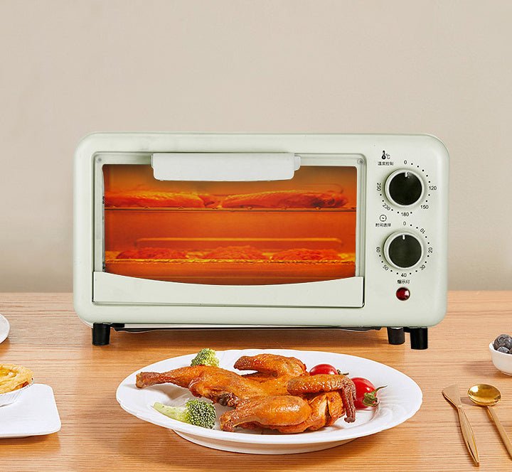 Front view of Automatic Timing Steaming And Baking All-in-one Machine Toaster Oven with food baking inside, placed on a wooden table with a meal.