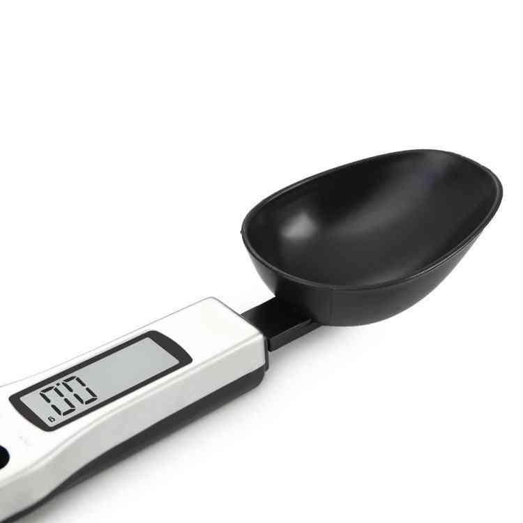 Digital Measuring Spoon with LCD display showing weight of granules, precision up to 500g and 0–30ml volume capacity, powered by AAA batteries.