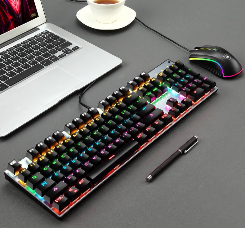 Mechanical waterproof gaming keyboard with RGB backlight connected to a laptop, ideal for desktop gaming setups. Features 104 keys and USB interface.