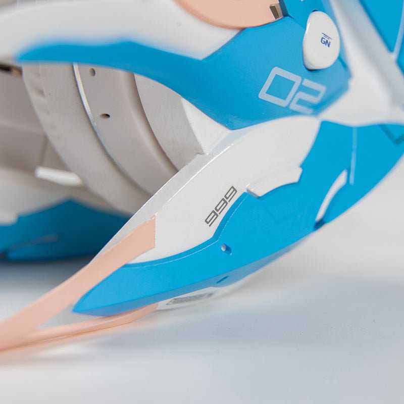 Butterfly Tech Mecha Wireless Bluetooth Headset in cyberpunk style with blue and peach winged ear covers, displayed on a wig mannequin stand.