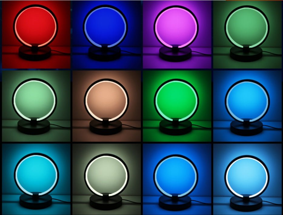 Atmosphere Desk Lamp Bedroom RGB Gaming Colorful Creative with circular LED design, placed beside a gaming monitor and RGB keyboard. Ideal for ambient lighting.