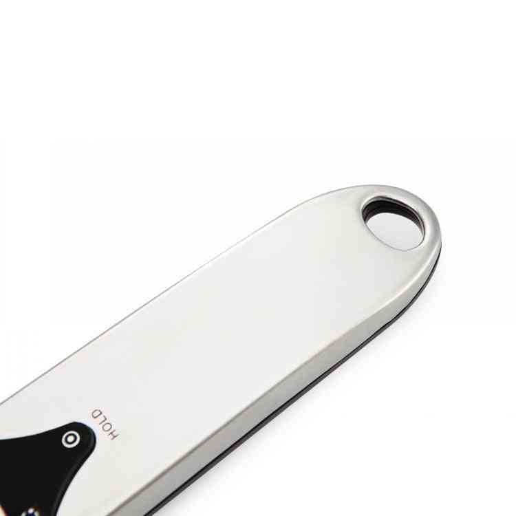 Digital Measuring Spoon with LCD display showing weight of granules, precision up to 500g and 0–30ml volume capacity, powered by AAA batteries.