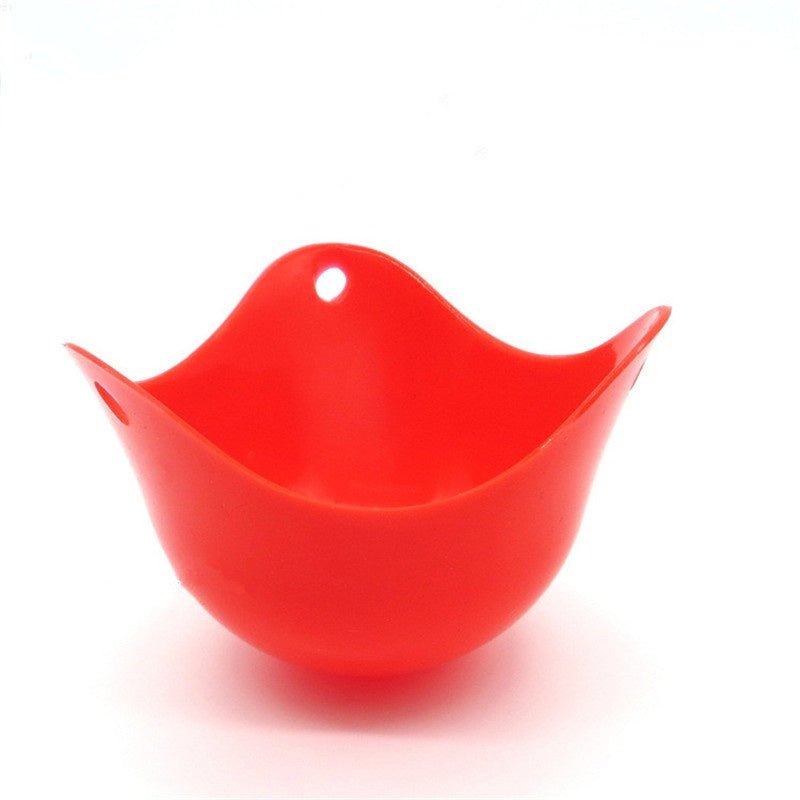 Green Silicone Egg Cooker 4 Color Silicone Egg Cooker set with eggs cooking in colorful silicone cups in a frying pan. Heat-resistant, non-stick kitchen tool.