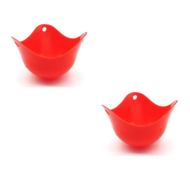 Green Silicone Egg Cooker 4 Color Silicone Egg Cooker set with eggs cooking in colorful silicone cups in a frying pan. Heat-resistant, non-stick kitchen tool.