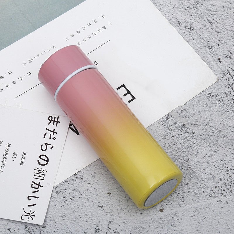 Intelligent stainless steel bottle cup temperature display vacuum flasks in pastel gradient colors, ideal for travel and hot or cold beverages.