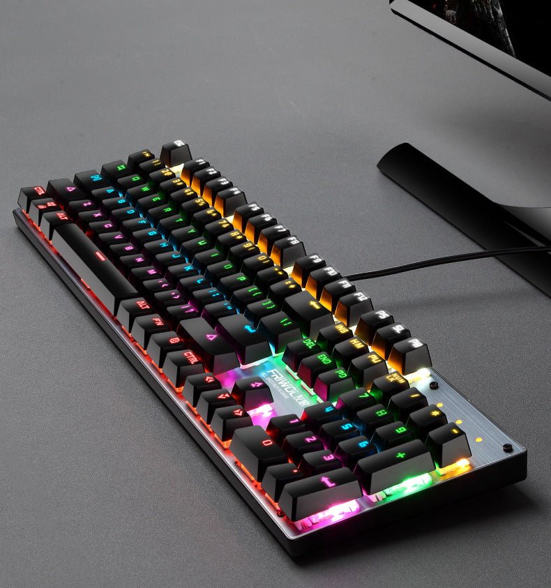 Mechanical waterproof gaming keyboard with RGB backlight connected to a laptop, ideal for desktop gaming setups. Features 104 keys and USB interface.