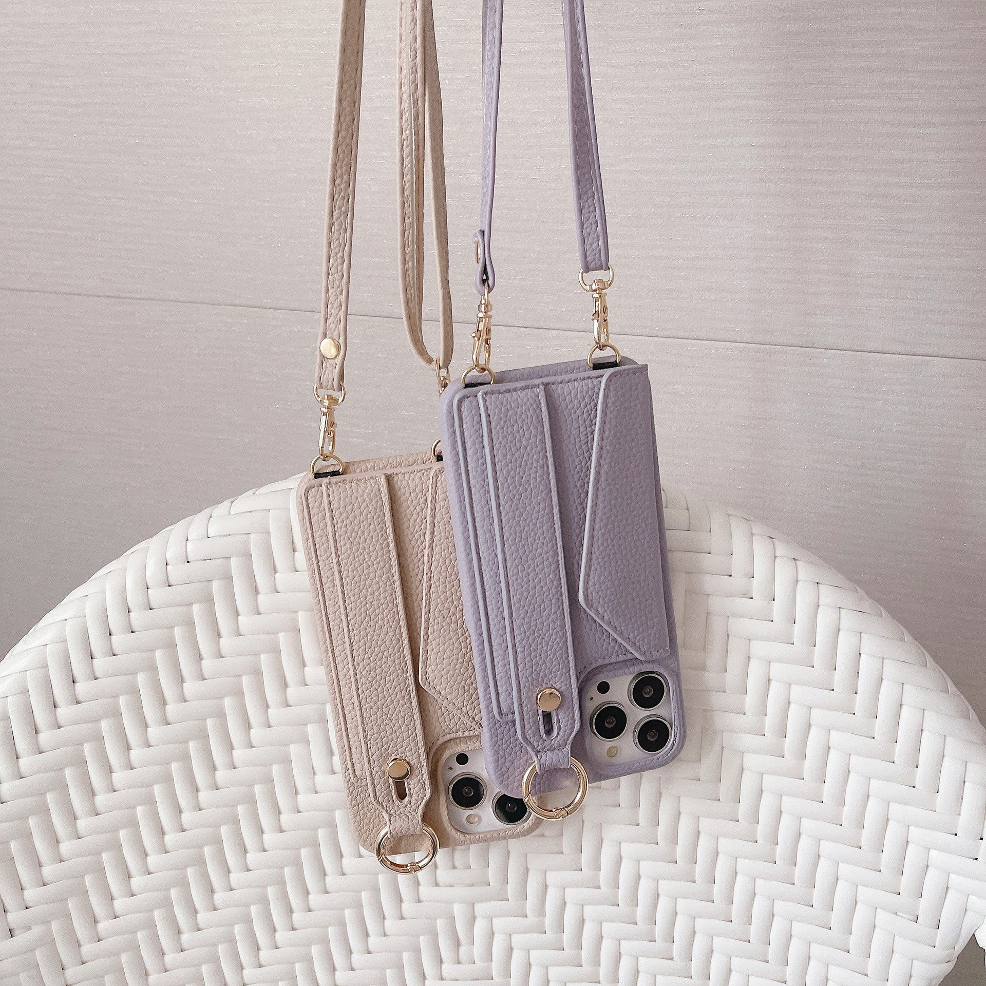 Fashion Simple Back Strap Phone Case Protector for iPhone in camel and light purple leather with crossbody strap and card slot design.