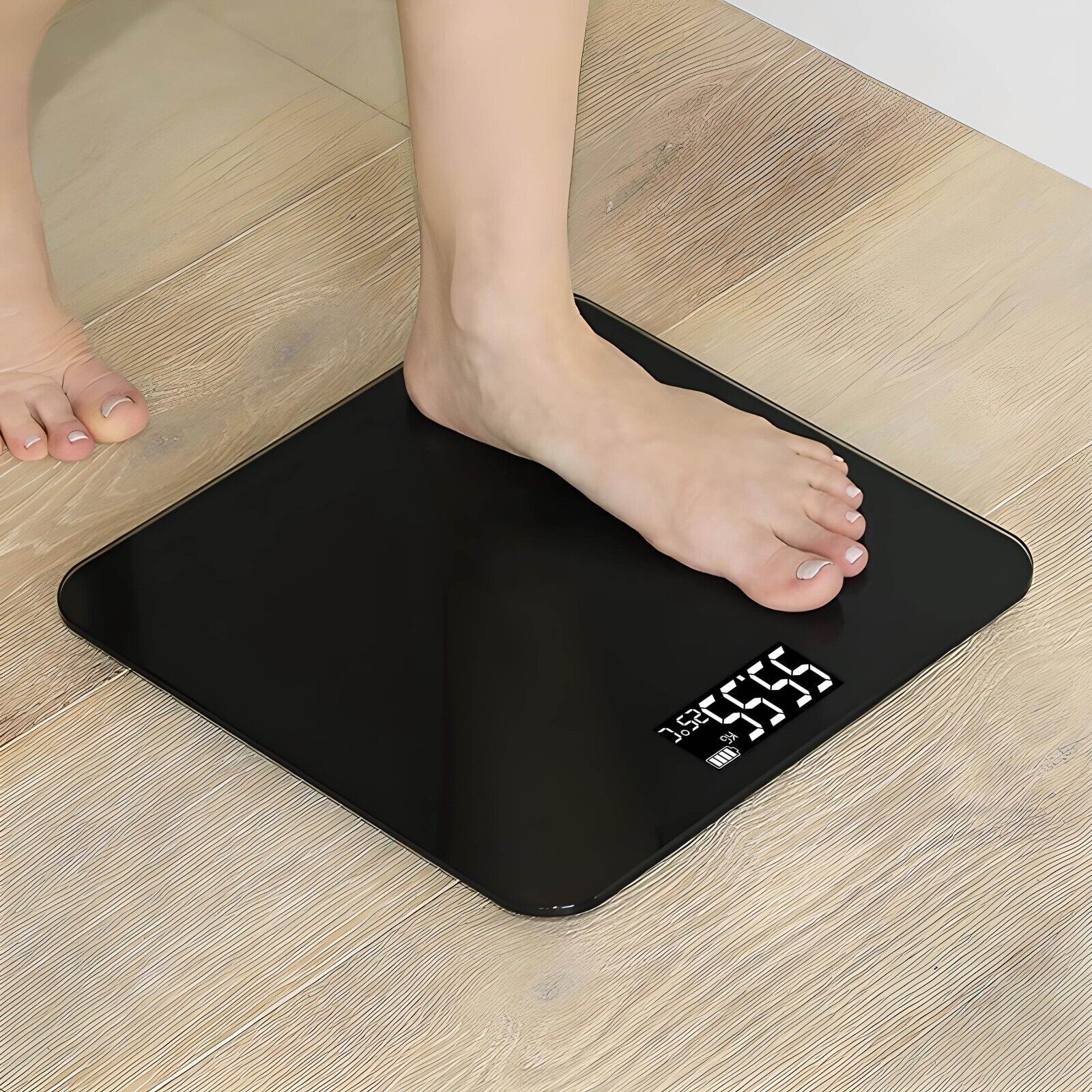 Digital passenger scale with high precision, black tempered glass platform, and large LCD display showing weight measurement