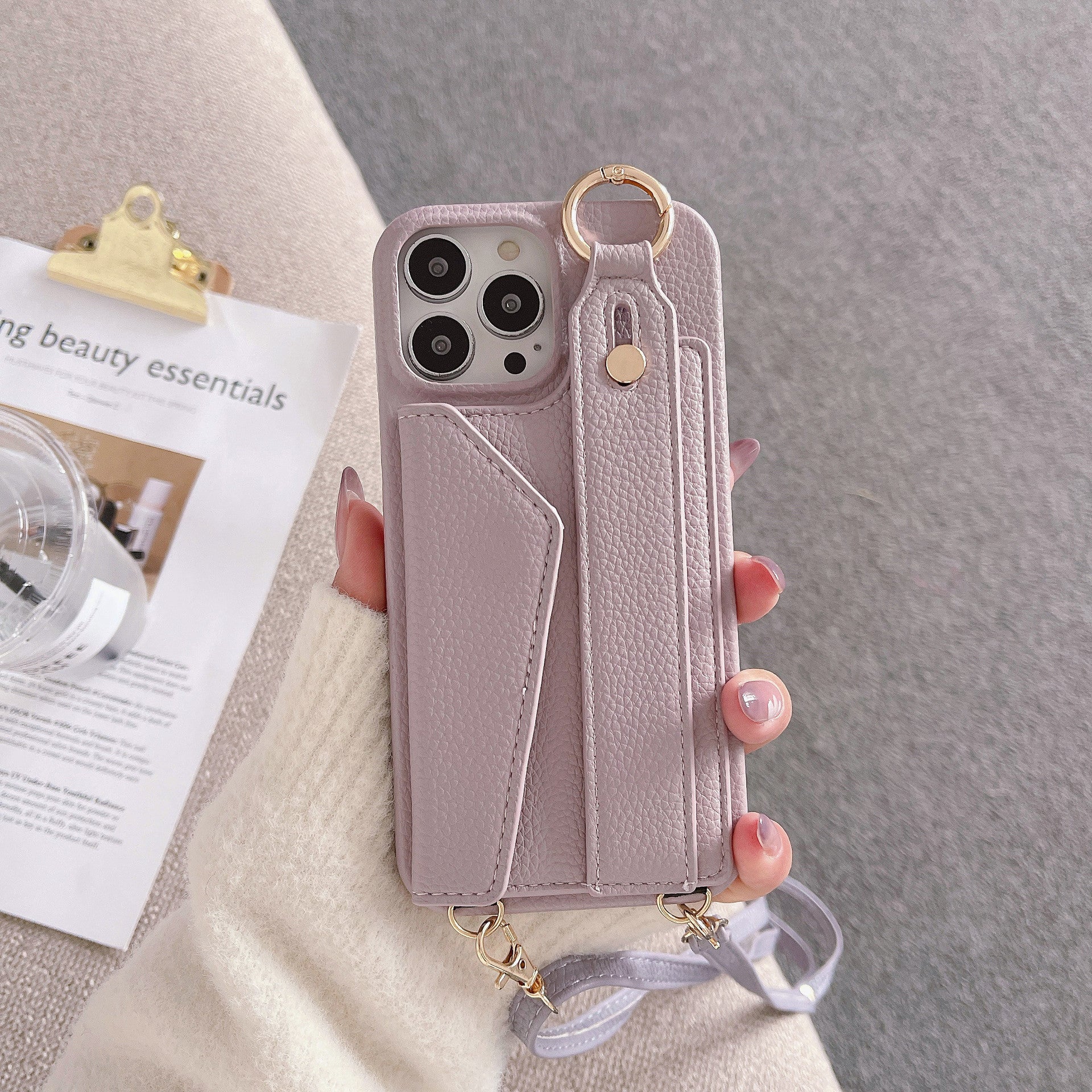 Fashion Simple Back Strap Phone Case Protector for iPhone in camel and light purple leather with crossbody strap and card slot design.