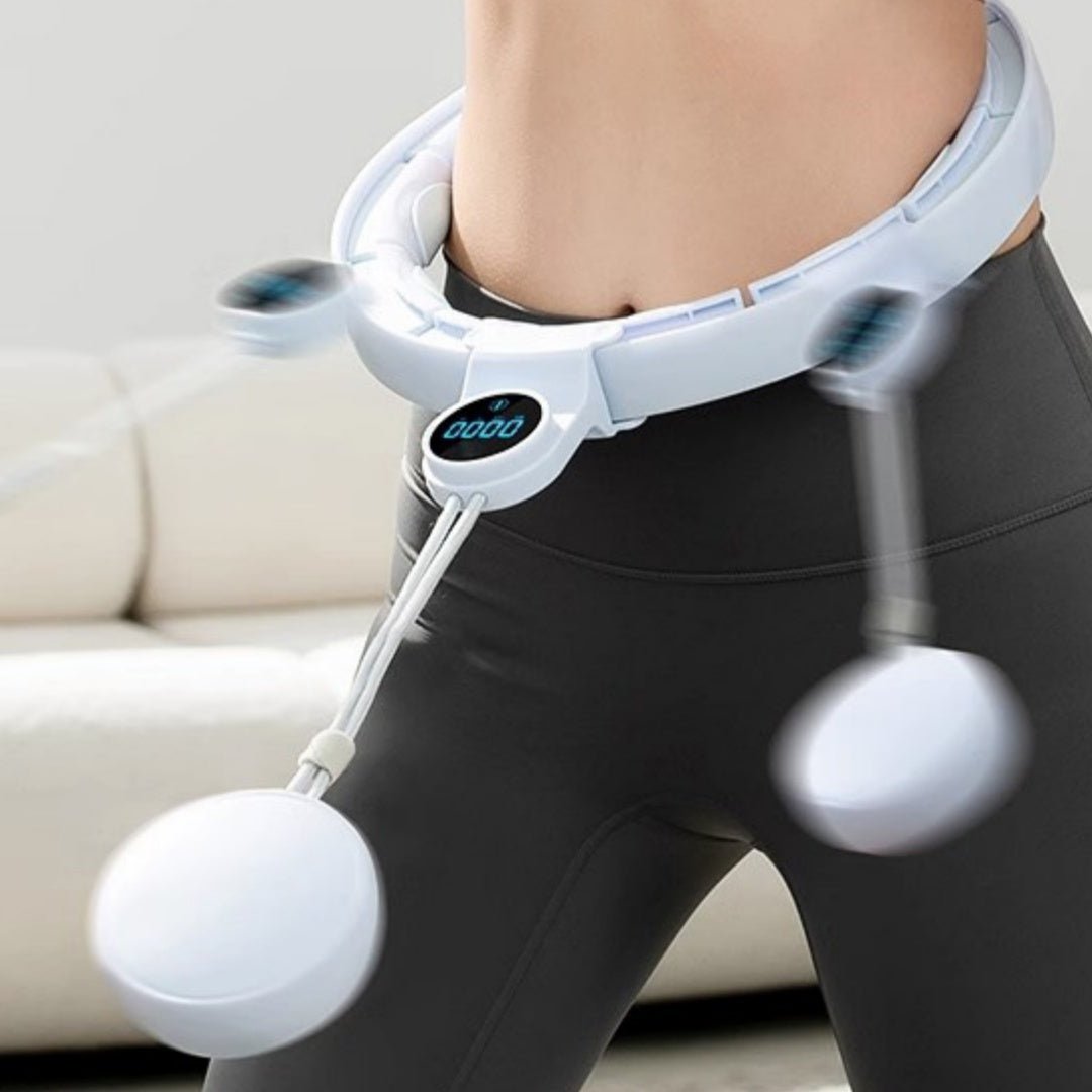 Removable fitness intelligent digital hula hoop worn on waist with LCD display and rotating weights for body shaping.