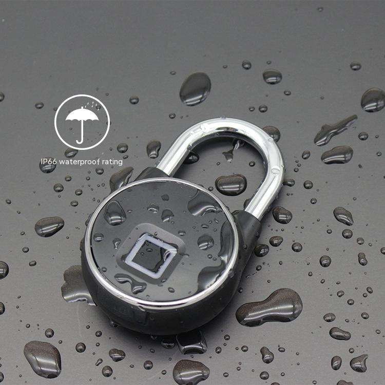 Waterproof new home electronic smart lock with fingerprint sensor and stainless steel shackle on wet surface